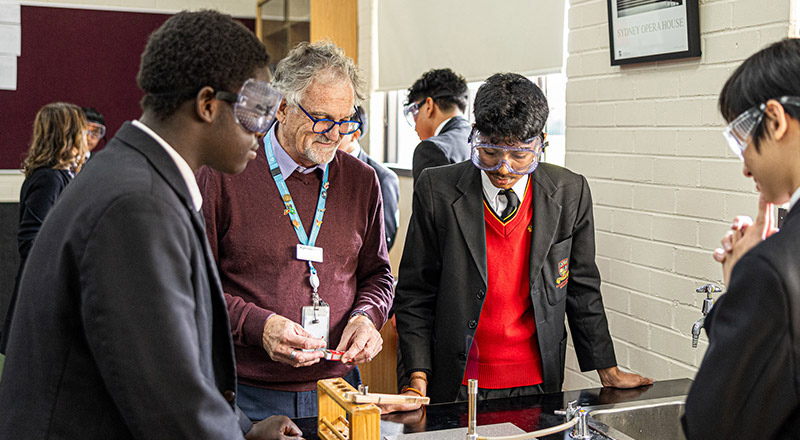 Dedicated teacher inspiring students at St Clare's Catholic High School Hassall Grove