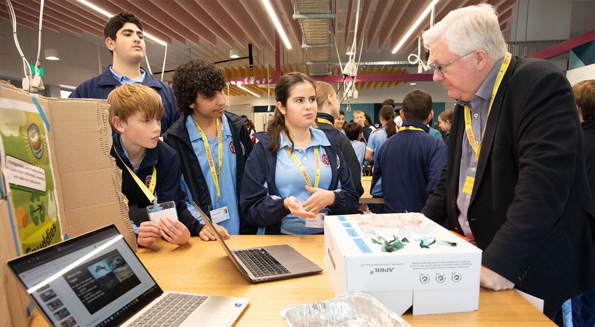 Jack De Groot, Director of CSPD, discussing STEM with inquisitive students