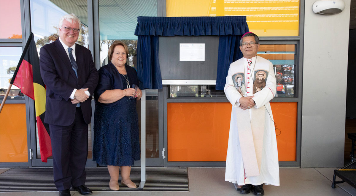 Bishop Vincent and Jack De Groot with St Francis of Assisi Principal Jenny Bellenger